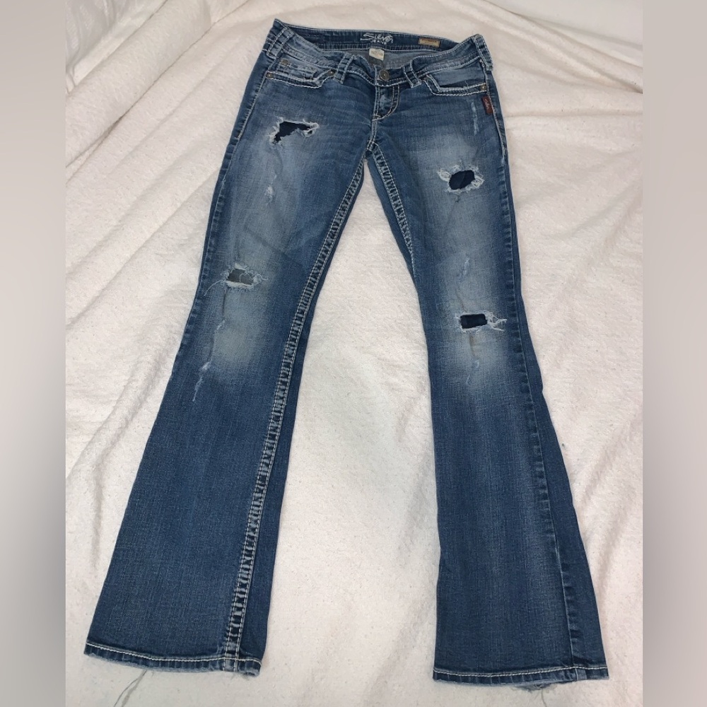 Silver Jeans Distressed Medium Blue Flare Jeans